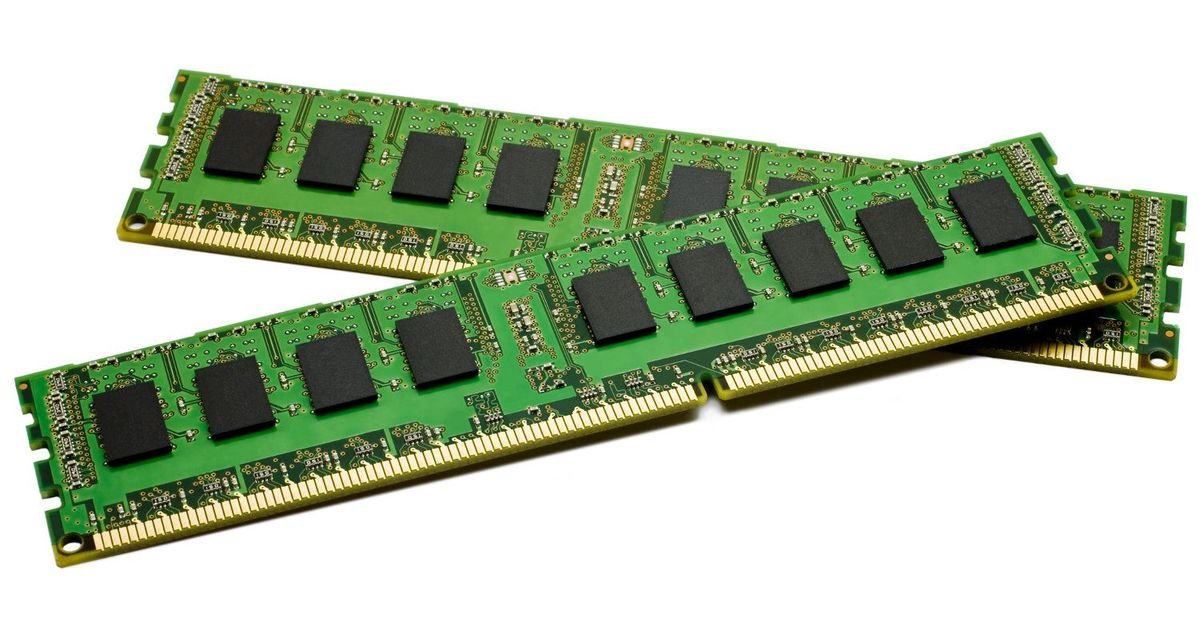 Three RAM sticks featuring green circuit boards with black chips mounted on them.